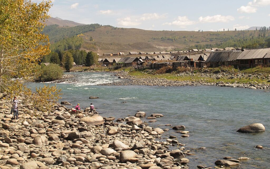 The Hemu River winding through the Tuvan village