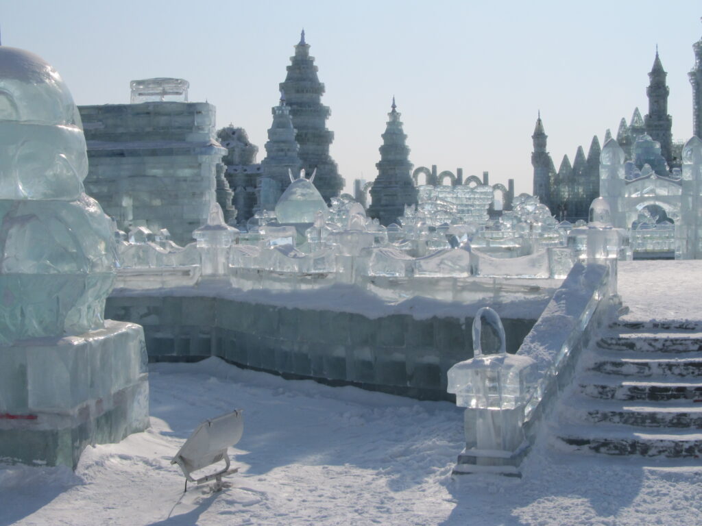 Colorful illuminated ice palaces at the Harbin Ice and Snow Festival