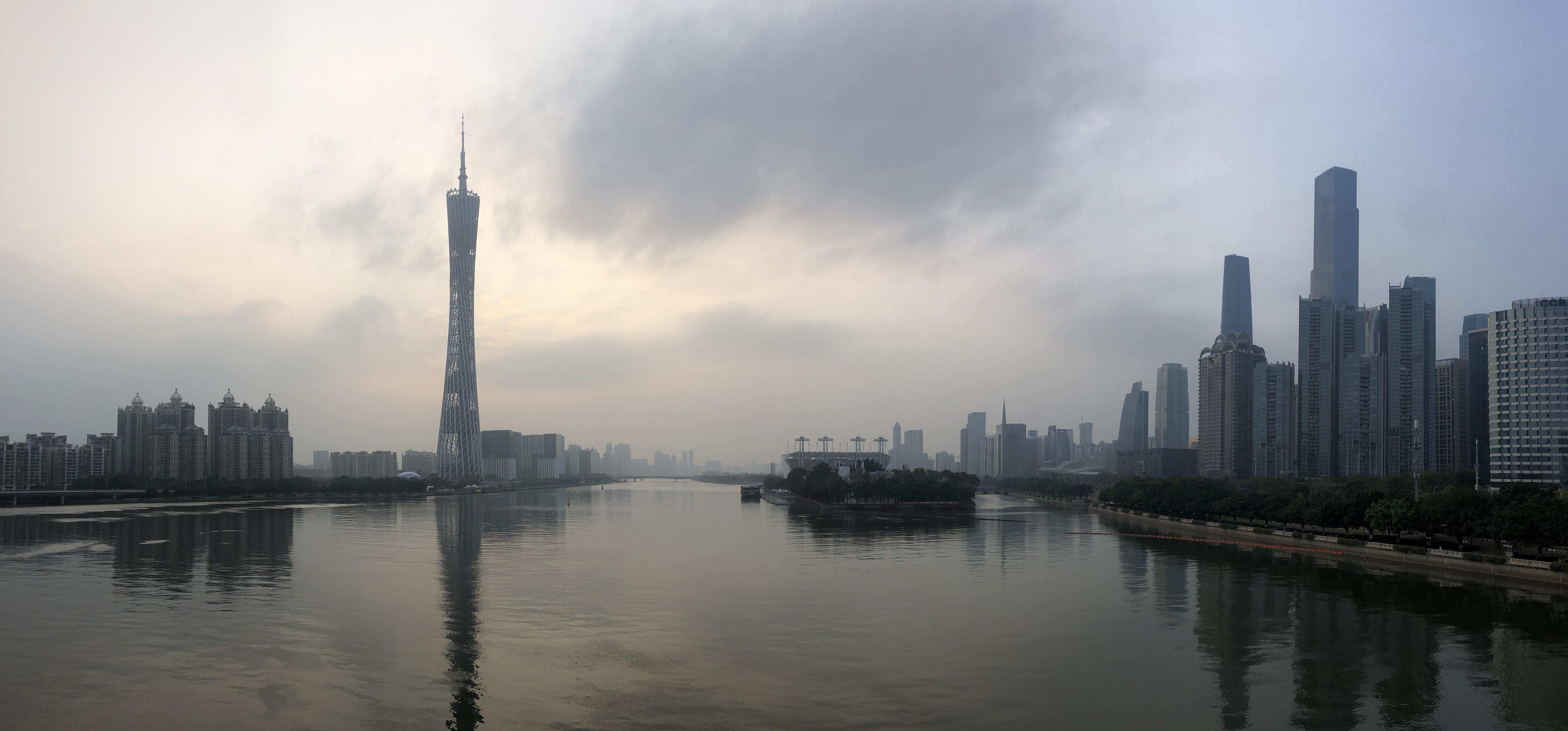 Guangzhou Guangzhou skyline with Pearl River and Canton Tower at dusk