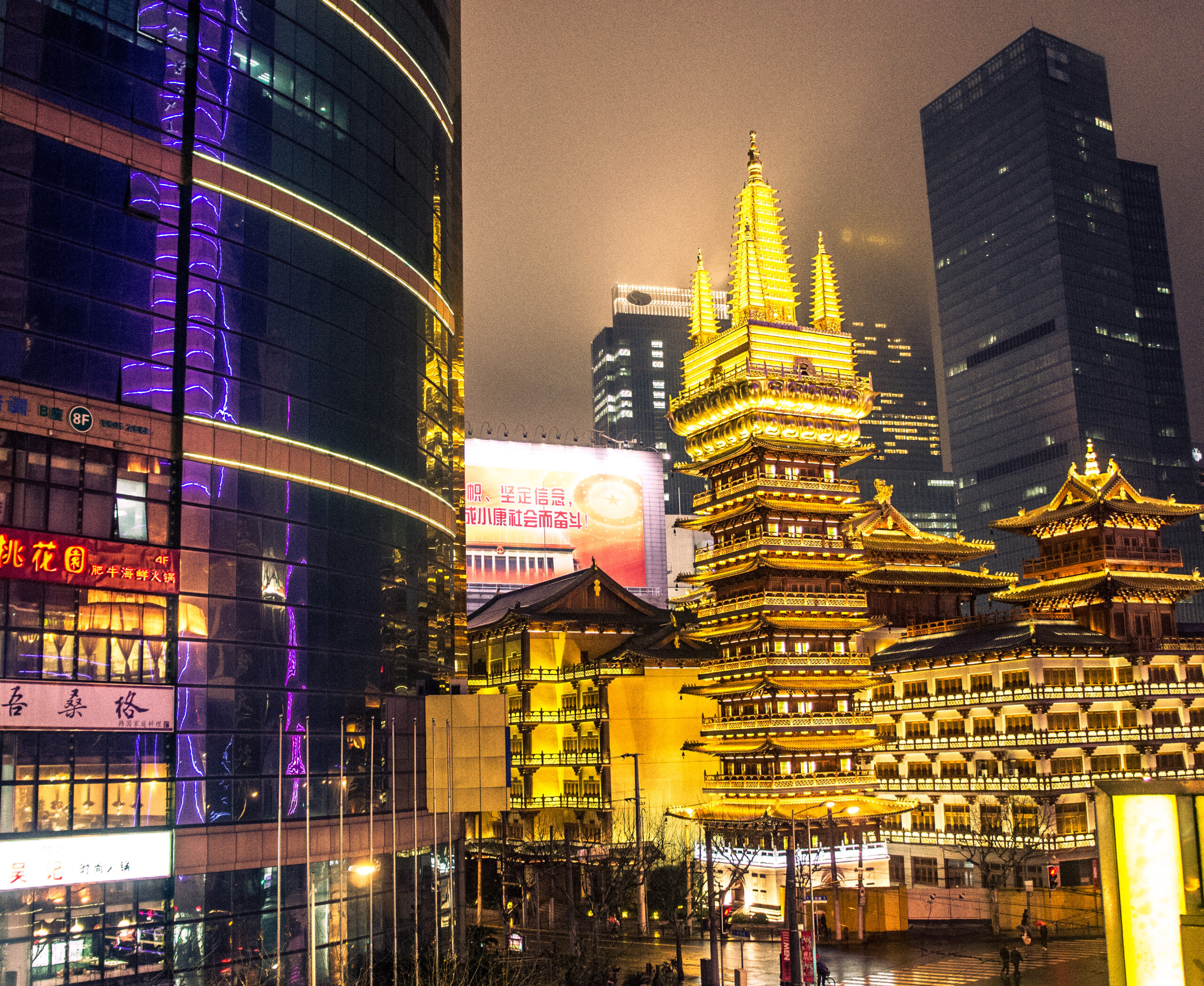Shanghai Side view and pagoda of Jingan Temple in Shanghai at night