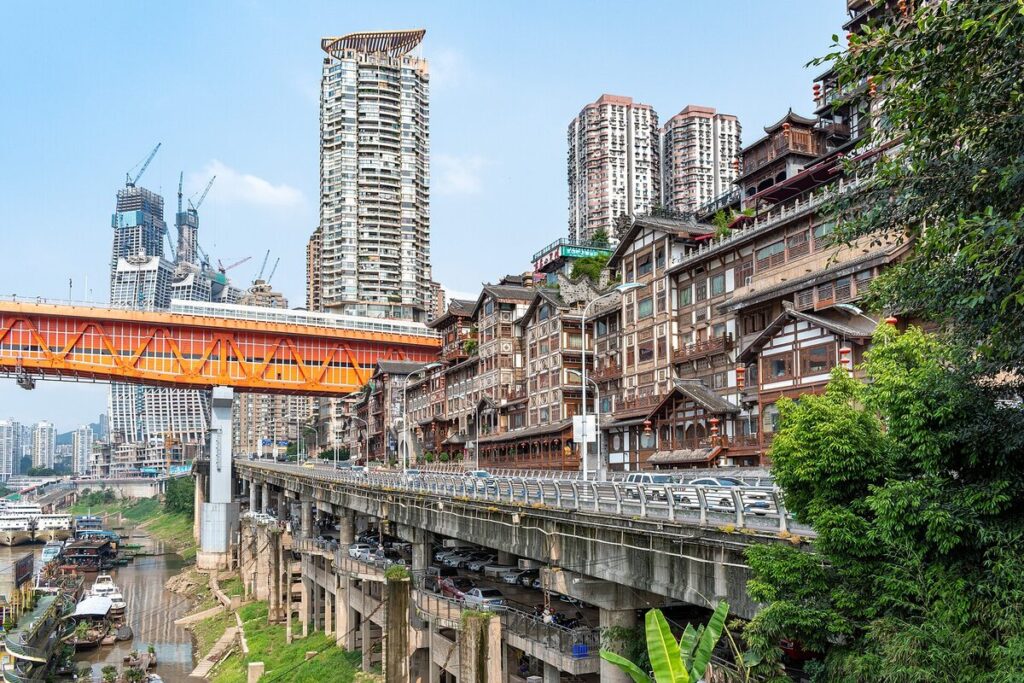 Chongqing Hongyadong stilted buildings illuminated above the Jialing River in Chongqing
