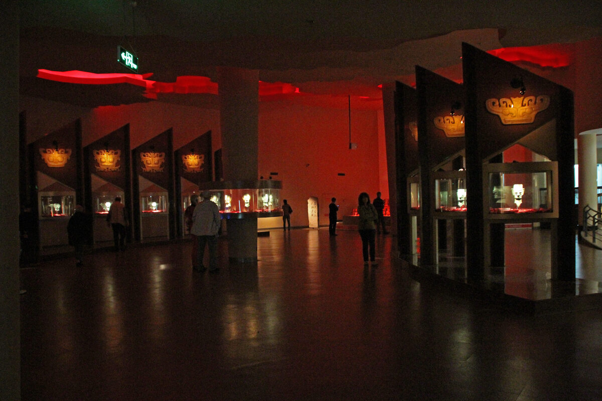 Bronze artifacts from the ancient Sanxingdui culture displayed in a modern museum hall